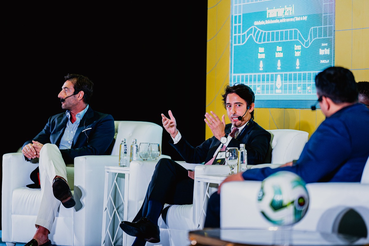 Michele Ciccarese and Alfonso de Stefano, seated during a panel in the 2023 Asian edition of World Football Summit.