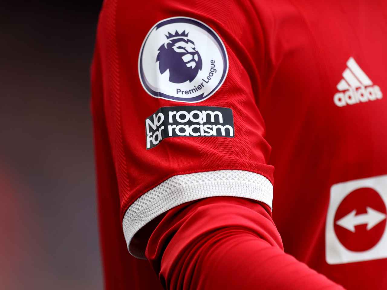 The 'No Room For Racism' logo can be seen in every Premier League jersey.
